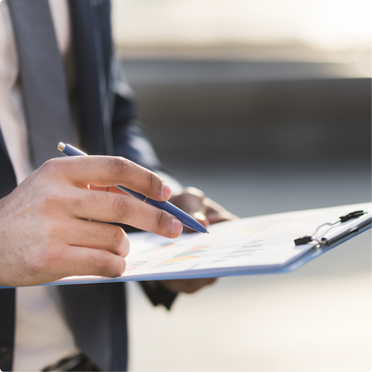 close-up-business-man-checking-clipboard